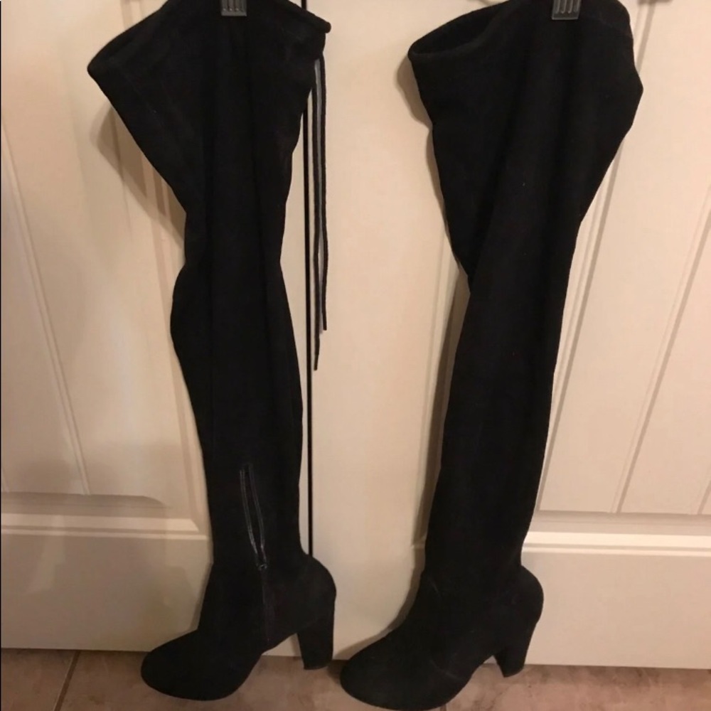 Thigh high black boots